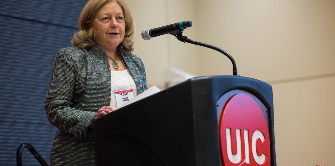 Dr. Keehn presenting the 2024 I-TEAM Award to Scholars and Leaders in Interprofessional Geriatrics at UIC Faculty Awards Ceremony